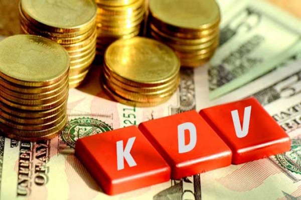 قطع وأوراق نقدية تعبر عن ضريبة القيمة المضافة (KDV